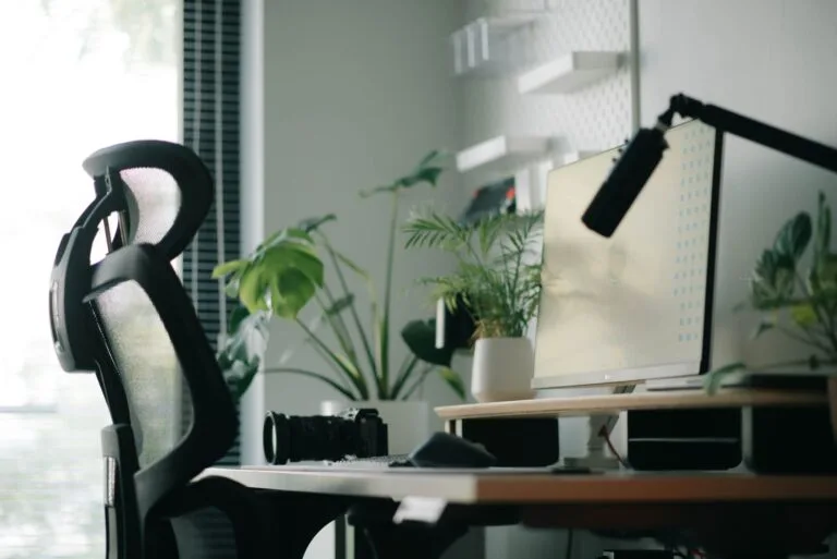 A clean product photo illustrating ergonomic chairs standing desks which eases back pain.